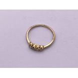 9ct Gold 4 stone diamond ring. Size L, 1.4gm appro