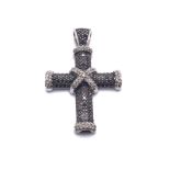 A 14Ct White Gold Black and White Dimond Cross 7.3