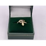 A 9ct gold ring in the form of a snake (size M)