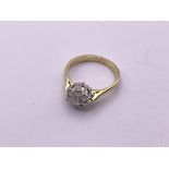 18ct gold diamond cluster (.2ct). Size L 1/2, 3.9g