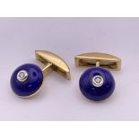 A pair of 18ct yellow gold and blue guilloche enam