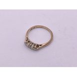 9ct Gold 3 stone diamond ring. Size N, 1.9gm appro