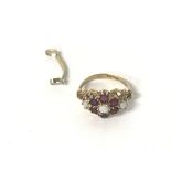 9ct gold Opel and ruby ring, K size ring 2.6g