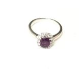 An 18k white gold amethyst and diamond ring size M.