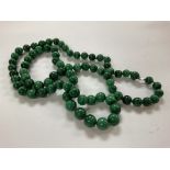 A string of malachite beads. NO RESERVE