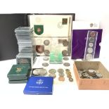 A collection of world coinage, commemorative coina