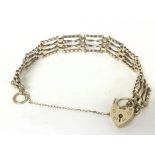 A 9ct gold Gate bracelet, 13.5g