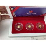 3 x left facing gold coins, 0.5g, cased.