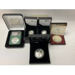 A collection of cased silver proof coins to includ