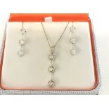 A Jonathan Geeves modern design jewellery set with
