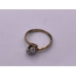 9ct 2 stone diamond ring. Size M1/2, 2.4gm. (A)
