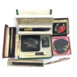 A cased Oriental cigarette case, holder and lighte