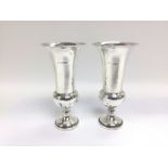 A pair of silver vases, London 1911, approx height
