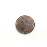 An 1852 Queen Victoria 1/2 penny.