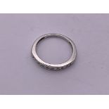 9ct white gold channel set Diamond 1/2 loop ring.