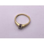 18ct gold diamond solitaire ring (.4gm). Size L, 2