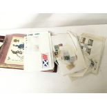 A collection of albums containing first day covers and other albums a mixed lot.