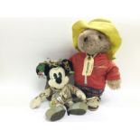 A Paddington Bear soft toy with original label tog