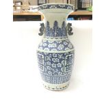 Large Oriental blue and white Double Happiness vase, decorated with floral patterns. 43cm tall.