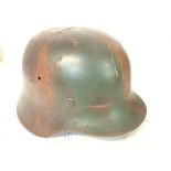 WW2 German M40 Stahlhelm Steel Combat Helmet. Green and Tan Normandy Camo with ventilation holes,