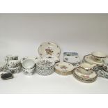 A collection of desert tea plates cups and saucers