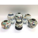 A collection of Oriental ginger jars and vases.