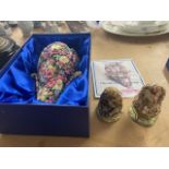 A Royal Winton old Chintz boxed wall pocket and two Beatrix potter figures.