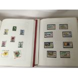 Three red Stamford Major stamp albums containing c