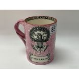 An unusual Sunderland lustre pearl ware mug with T