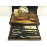 A vintage cased geometry set.