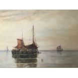 A framed watercolour study of moored sailing barge