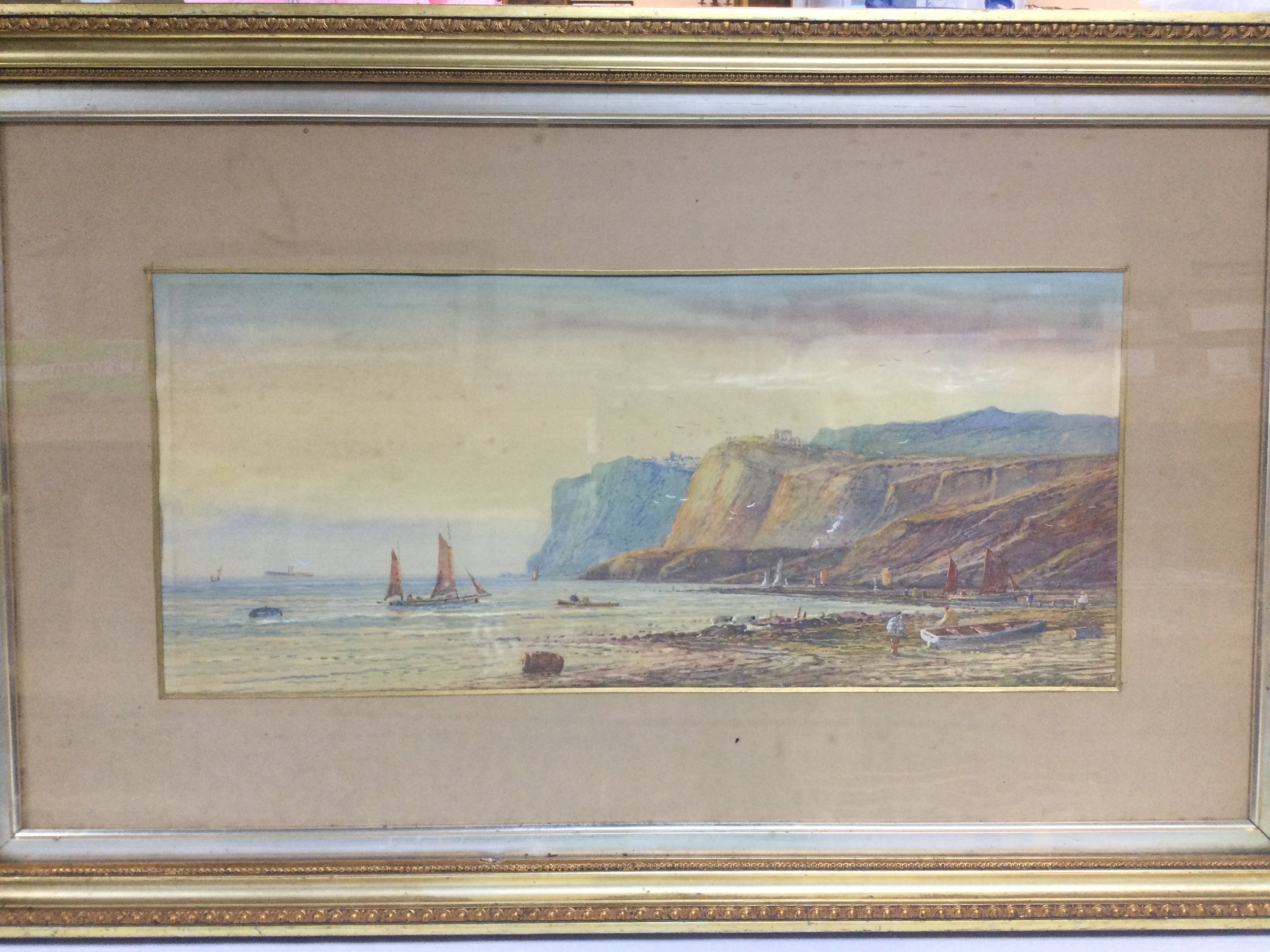 A pair of gilt framed watercolours of coastal scenes, signed by M.D. Angell, 1905, approx 81cm x