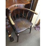 An elm seated captain's chair.