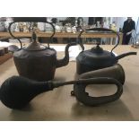 Brass car horn and two copper kettles
