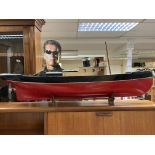 Motorised boat with stand. Approximately 123cm lon