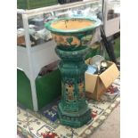 A Chinese glazed jardiniere and stand, approx total height 90cm.