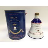 A cased Commemorative bottle of Bell's whisky.