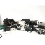 A collection of various vintage cameras including