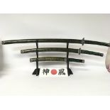 Reproduction samurai swords with stand