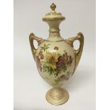 A hand painted Royal Worcester porcelain vase with