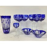 A collection of blue flash glass