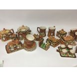 A collection of cottage ware ceramics including bi