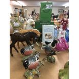 A collection of Beswick including pony birds and f