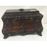 A George III style mahogany tea caddy box with ela