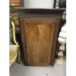 A George III mahogany corner cabinet 77wide 48deep