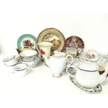 A collection of assorted tea set cups, plates, jug