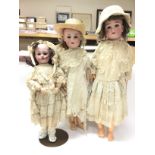 3 early Porcelain and composite body dolls to incl
