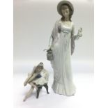 Two boxed Lladro figures comprising a lady and a b
