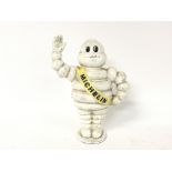 A reproduction Michelin man money box, approximate