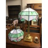 A Tiffany style table lamp and a conforming ceilin